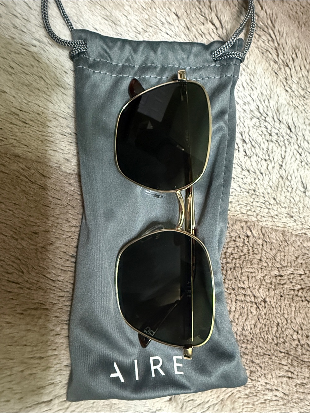 AIRE Women's Gold Frame Sunglasses with Black Lenses